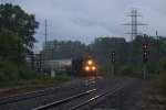 Just after dawn on a wet morning, Z127 comes north through Atwood Jct